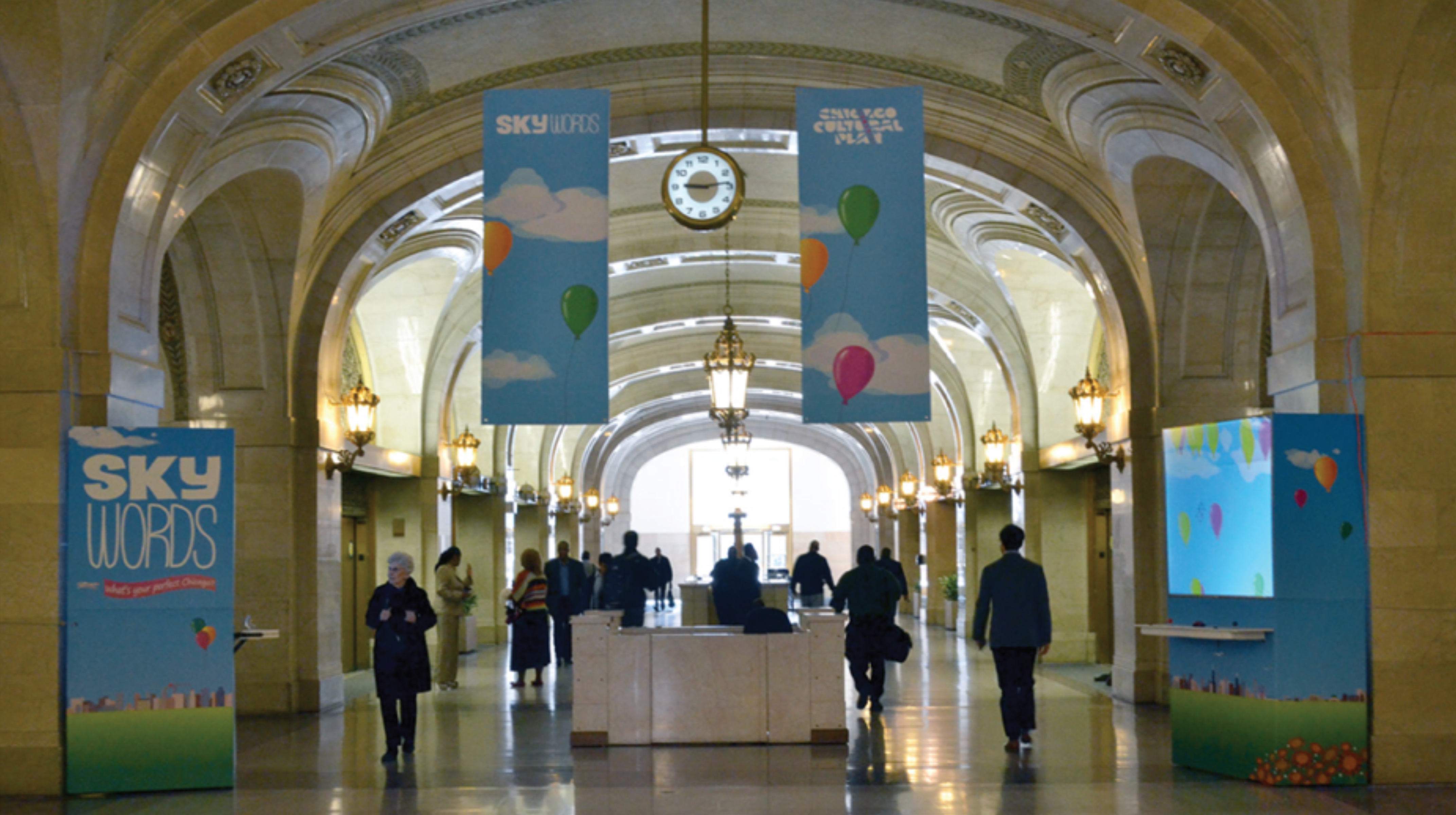 SkyWords installation at Chicago City Hall showing citizens interacting with the civic engagement machine